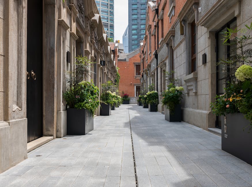 A picturesque urban alley in Jing An Qu, showcasing modern and classic architecture in Shanghai, China